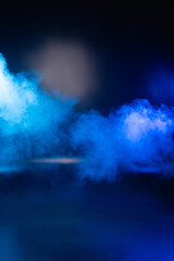 blue dark background with smoke and copy space