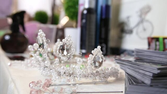 The wedding diadem lies on the table. Out of focus to focus. Video
