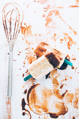 Top view of banana chocolate   popsicle spread over a wooden background, summer concept
