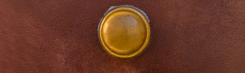 Closeup on a round door handle with decorative elements, door decoration