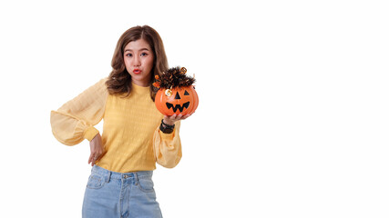 Portrait of Asian woman holding curved pumpkin and looking at pumpkin isolated over white background Halloween concept.