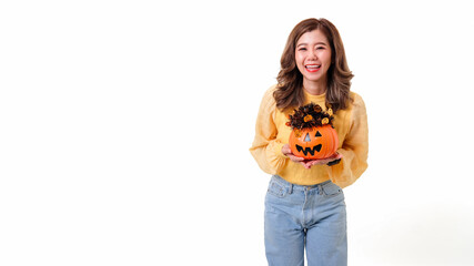 Portrait of Asian smiling woman holding curved pumpkin and looking at camera isolated over white background Halloween concept.