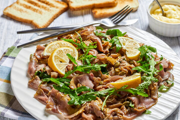 tuna salad with capers, rocket, pine nuts