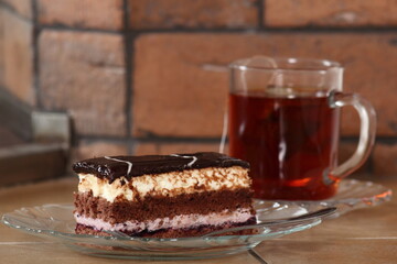 Layer cake with fruit and cream fillings decorated chocolate icing