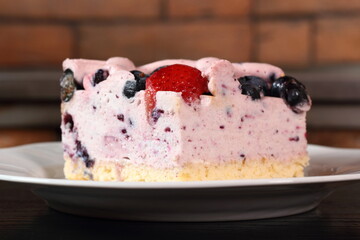 Cold cheesecake with blueberry and strawberry