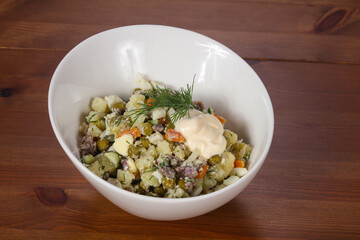 Traditional Russian salad with meat