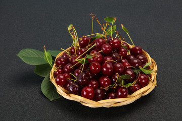 Sweet ripe cherry with leaves