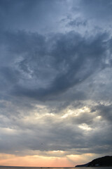 dark clouds over the sea