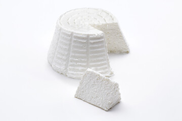 Ricotta cheese isolated on white background