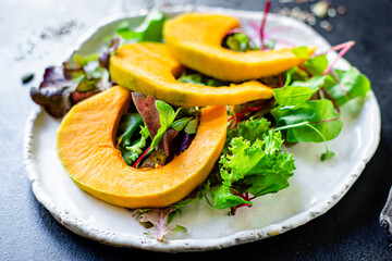 healthy pumpkin salad lettuce leaves organic ingredient eat cook snack meal on the table tasty serving size portion top view copy space for text food background rustic keto or paleo diet