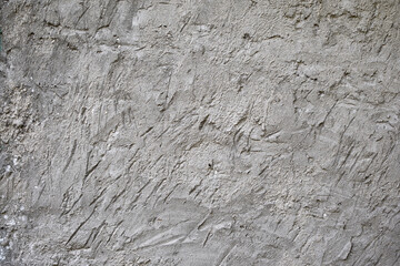 Plastered gray wall. Plaster background.Cement pattern.
