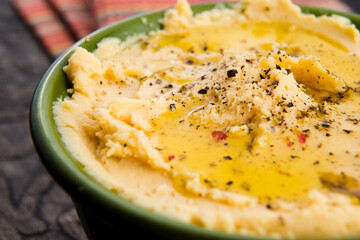 A bowl of creamy hummus