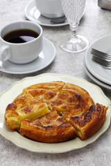 Kouign Amann is a pastry made with a lot of butter from the Brittany region of France.
