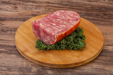 Beef ham piece over board