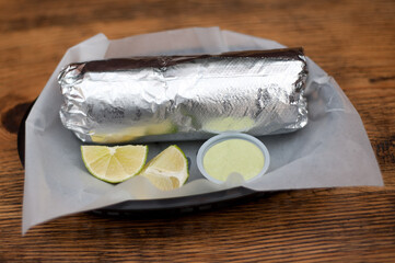 Burrito wrapped in aluminum foil