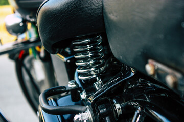 Closeup of a motorcycle parked in the streets of the city center of the metropolitan area
