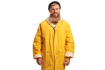 Bearded fisherman with a yellow rain coat smiling