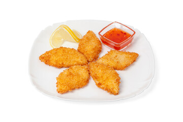 Fried Chicken pieces served with chili sauce isolated on white