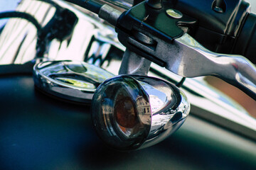 Closeup of a motorcycle parked in the streets of the city center of the metropolitan area
