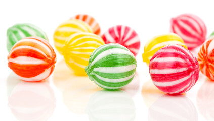 colored candies isolated on white.