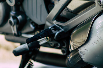 Closeup of a motorcycle parked in the streets of the city center of the metropolitan area
