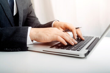 businesswoman hand using smart phone, tablet payments and holding credit card online shopping, omni channel, digital tablet docking keyboard computer at office in sun light