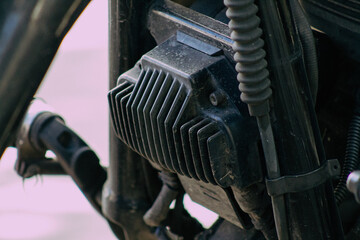 Closeup of a motorcycle parked in the streets of the city center of the metropolitan area
