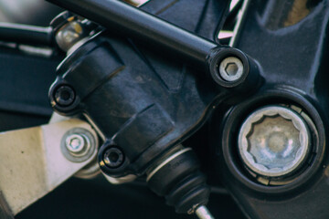 Closeup of a motorcycle parked in the streets of the city center of the metropolitan area
