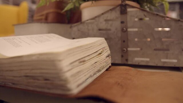 Book opening in slow motion. Leather book 4k
