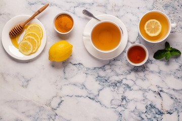 Obraz na płótnie Canvas Green tea with lemon and honey, Immunity boosting and cold remedies.