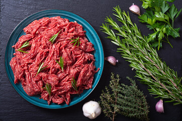 Fototapeta premium raw beef ground with ingredient