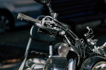 Closeup of a motorcycle parked in the streets of the city center of the metropolitan area
