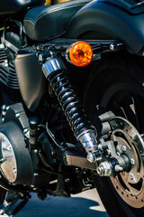 Closeup of a motorcycle parked in the streets of the city center of the metropolitan area
