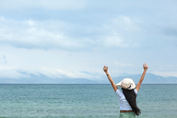 happy woman  in sea background