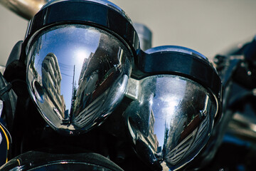 Closeup of a motorcycle parked in the streets of the city center of the metropolitan area
