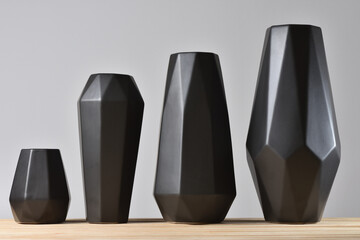 Set of modern black vases in geometry style