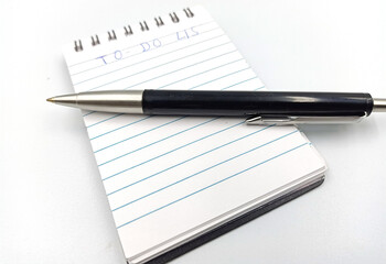 notebook with to do list on white background, planning and design concept
