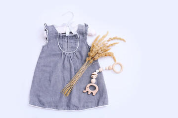 Fashion trendy look of baby girl clothes and toy stuff. Baby fashion concept