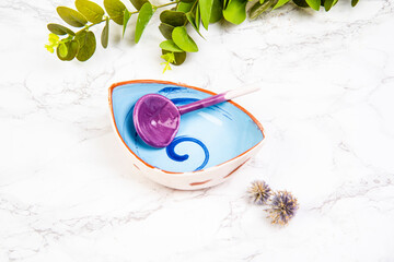 colorful ceramic bowl with spoon
