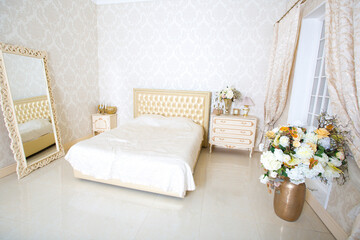 Fototapeta na wymiar Luxury elegant white with gold interior design of bedroom