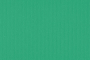 A vintage rough sheet of the carton with a gradient color. Recycled environmentally friendly retro cardboard paper texture. Simple and bright minimalist papercraft background.