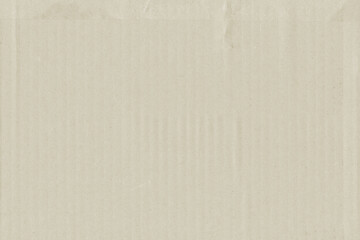A vintage rough sheet of the carton with a gradient color. Recycled environmentally friendly retro cardboard paper texture. Simple and bright minimalist papercraft background.