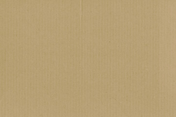 A vintage rough sheet of the carton with a gradient color. Recycled environmentally friendly retro cardboard paper texture. Simple and bright minimalist papercraft background.