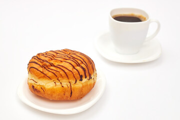 chocolate donut and coffee cup on white background isolate, copy space