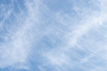 white clouds in the blue sky. Background