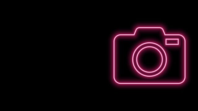 Glowing neon line Photo camera icon isolated on black background. Foto camera icon. 4K Video motion graphic animation