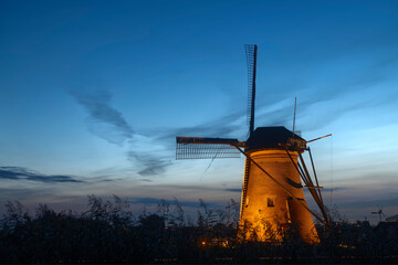 Illuminated windmill at Kinderdijk, The Netherlands.