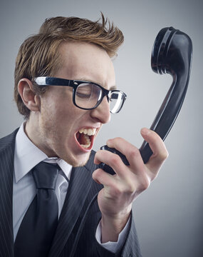 Angry nerd businessman