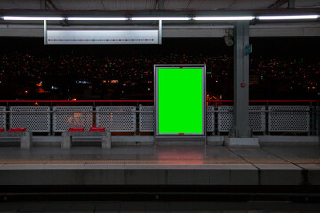 billboard in the subway station in the evening at night