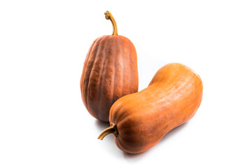 Two different red pumpkins on white isolated background